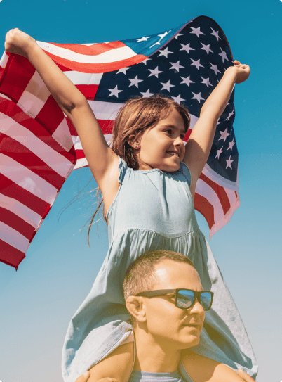 Children celebrating with American flag, symbolizing patriotism and health.
